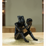 Abstract Man Reading a book sculpture