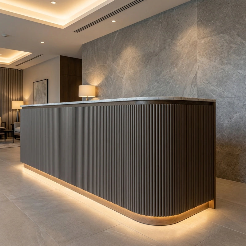 Contemporary Reception Desk with Dark Brown Paintable Fluted Panel Cladding and Cove Lighting