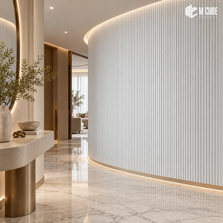 MLV-UME-147 flexible PVC finish louver panel on curved fluted feature wall in luxury residential foyer, 6 mm HDHMR-backed interior cladding
