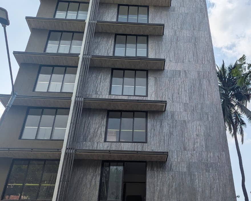 Stone Veneer from M Cube Spaces used for External Cladding - Fire Rock Marble